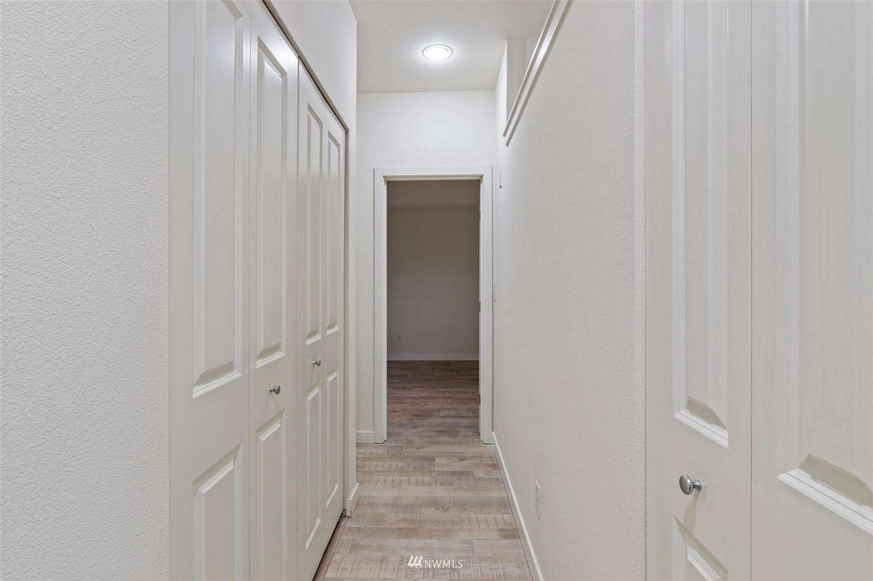 3901 243rd Place Southeast, Unit O102 Bothell, WA 98021 - Photo 18 of 32 a view of a hallway
