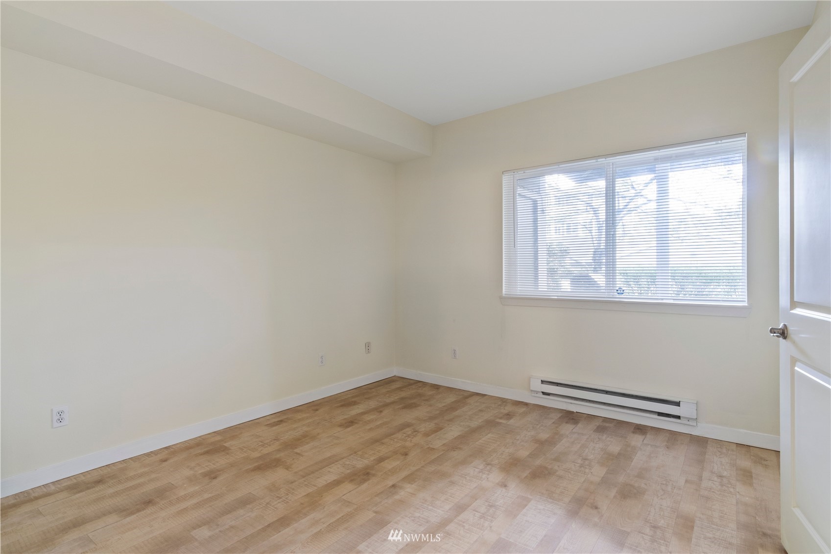 3901 243rd Place Southeast, Unit O102 Bothell, WA 98021 - Photo 22 of 32 an empty room with a window