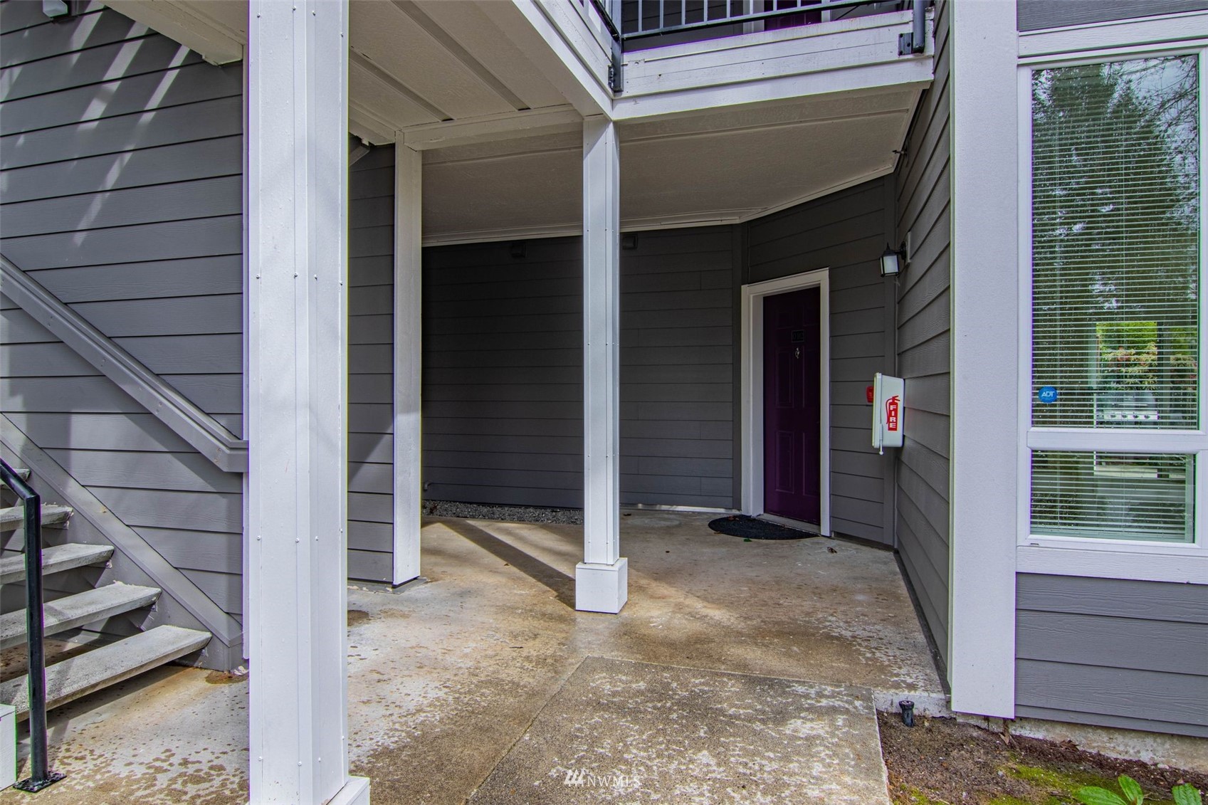 3901 243rd Place Southeast, Unit O102 Bothell, WA 98021 - Photo 5 of 32 a view of front door of house