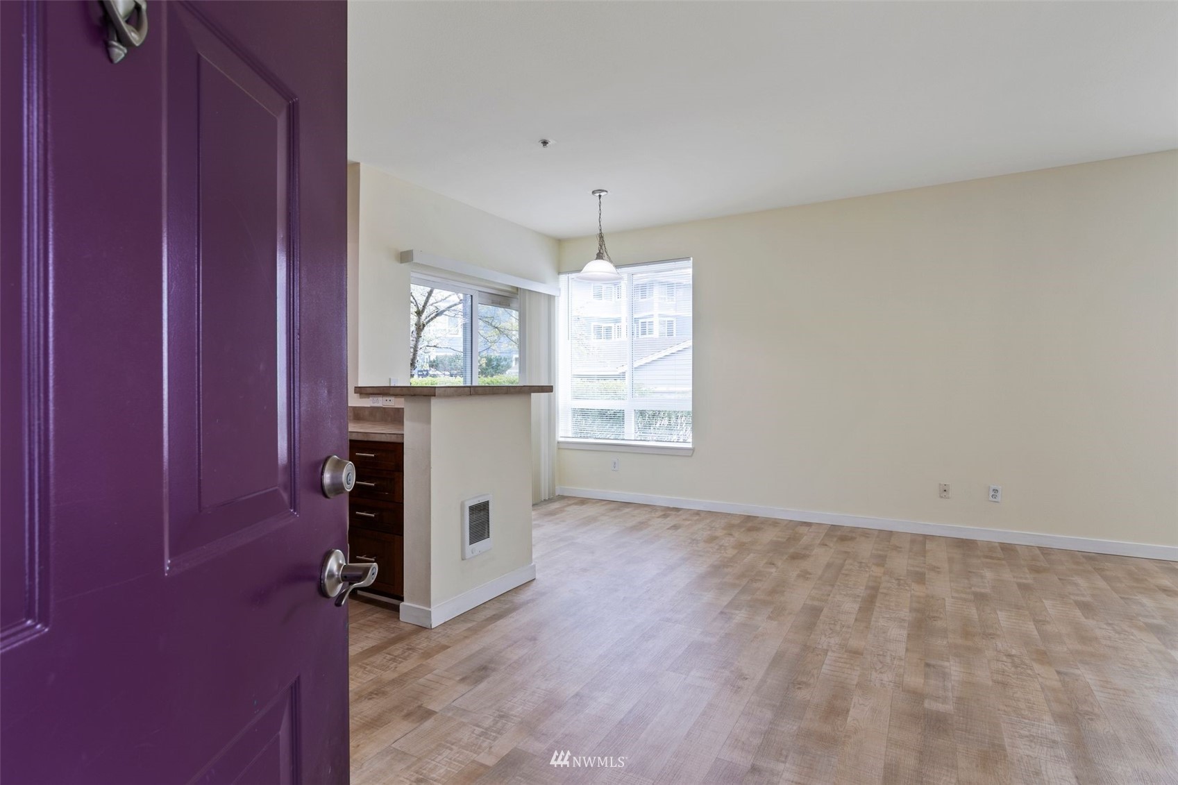 3901 243rd Place Southeast, Unit O102 Bothell, WA 98021 - Photo 6 of 32 wooden floor and window in a room