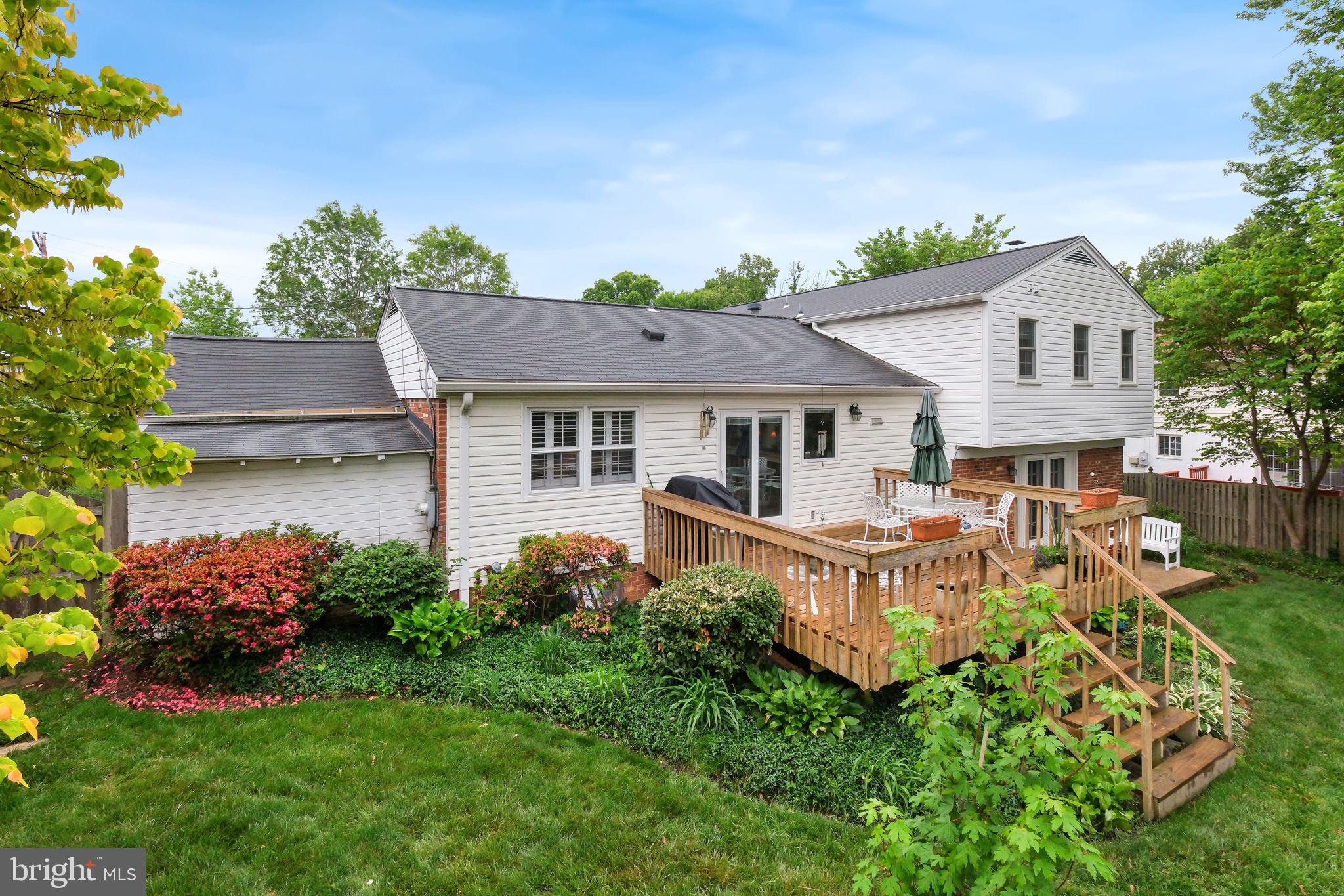 8815 Postoak Road Potomac, MD 20854 - Photo 40 of 45 front view of a house with a yard