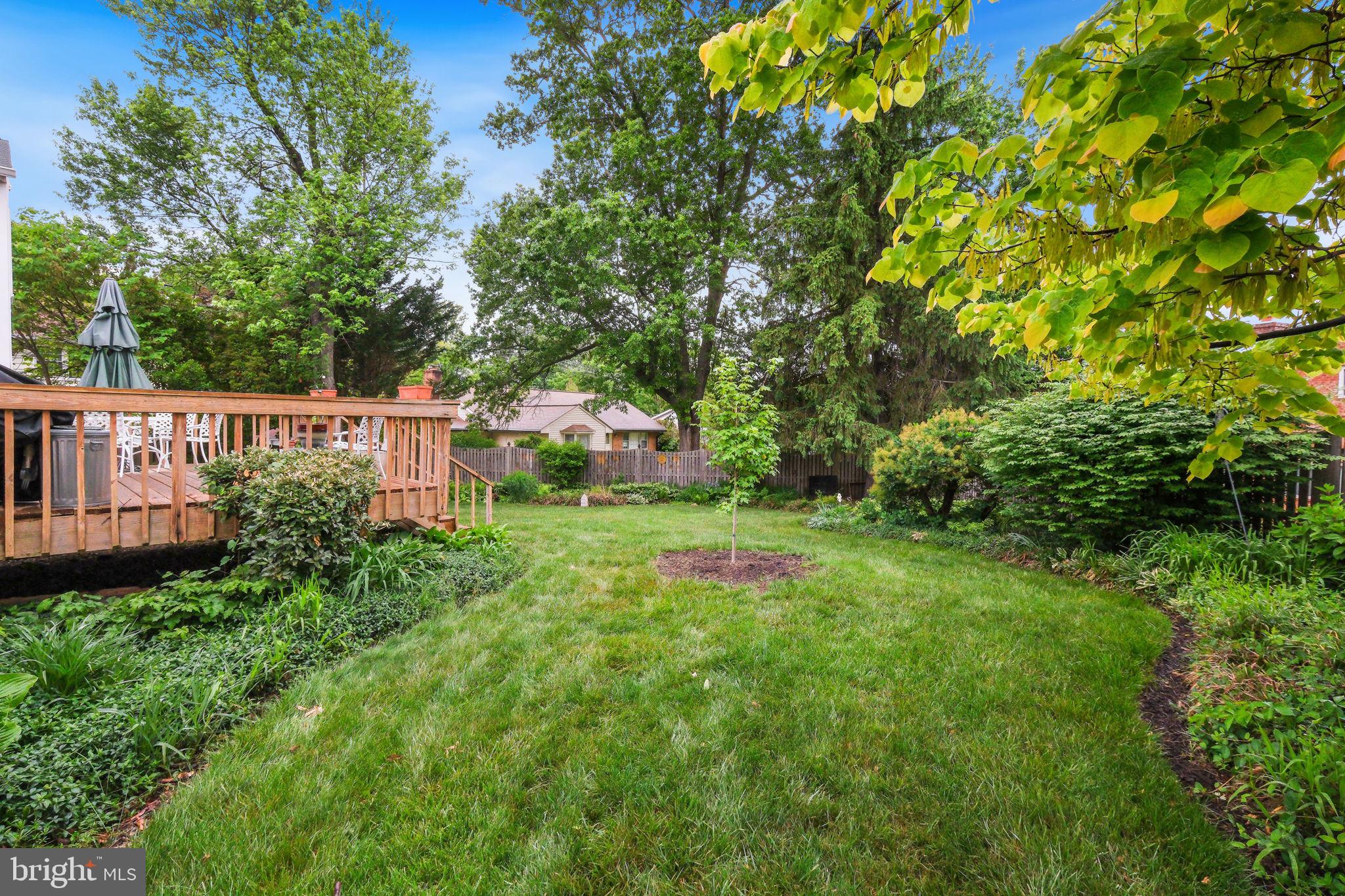 8815 Postoak Road Potomac, MD 20854 - Photo 44 of 45 a view of backyard with deck and garden