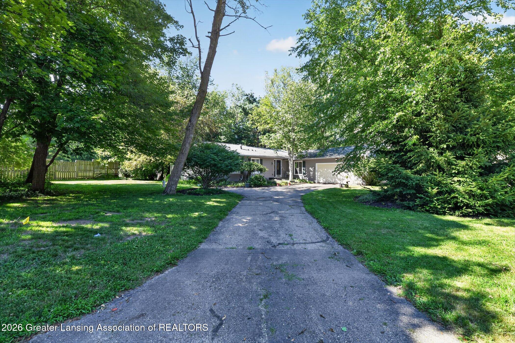 201 Ruby Way Williamston, MI 48895 - Photo 2 of 38 02-201-Ruby-Way-Windowstill-Photography