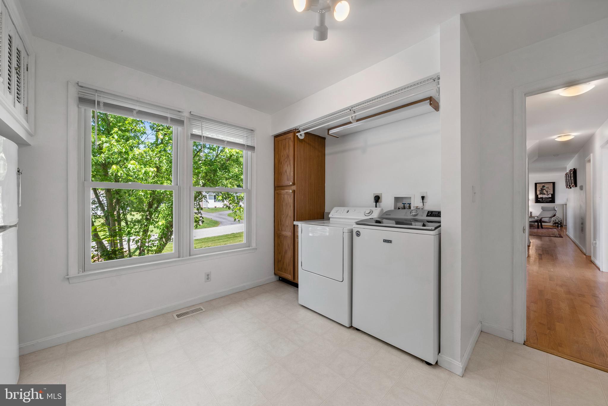 13555 South View Road Newburg, MD 20664 - Photo 25 of 74 Main level laundry with cabinetry