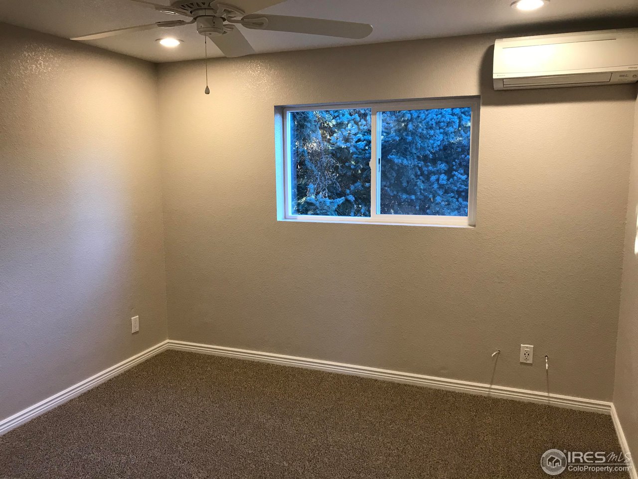 1065 Modred Street Lafayette, CO 80026 - Photo 20 of 23 an empty room with a window