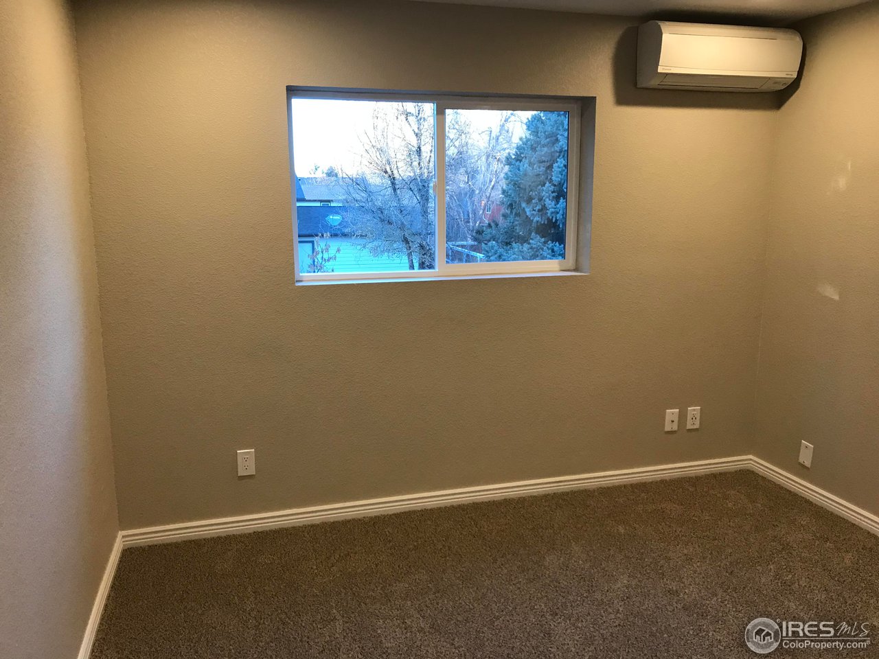 1065 Modred Street Lafayette, CO 80026 - Photo 21 of 23 an empty room with a window