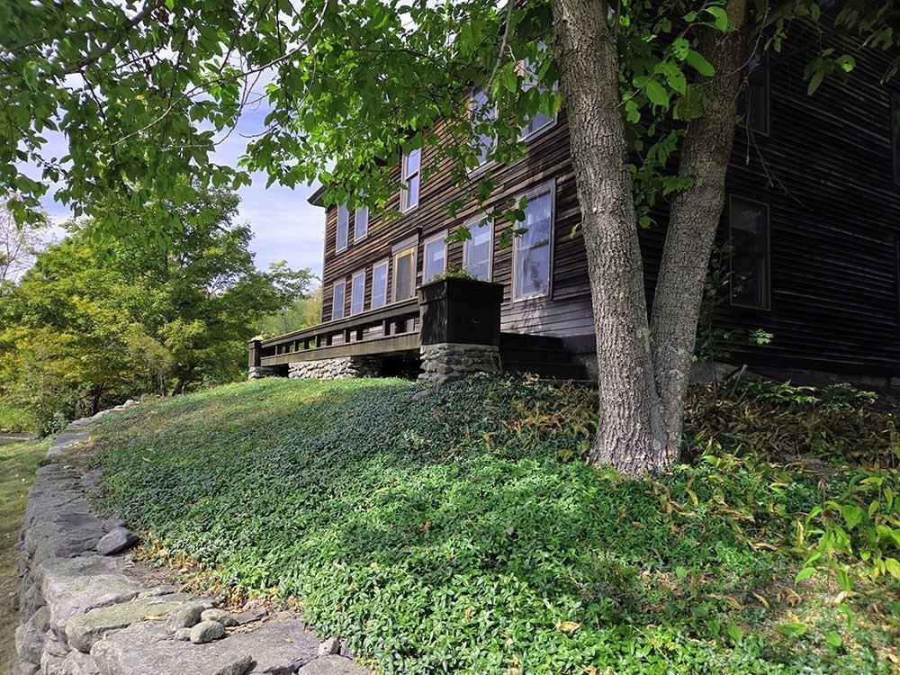 47 Harty Drive Petersham, MA 01366 - Photo 2 of 39 a front view of a house with a yard