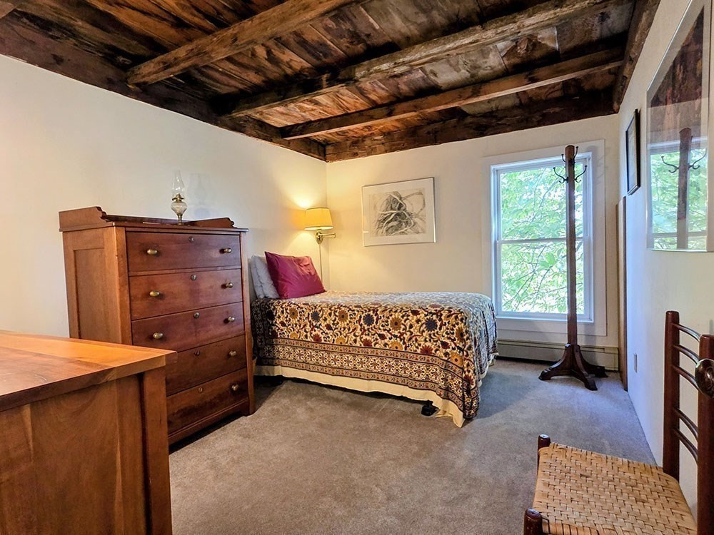 47 Harty Drive Petersham, MA 01366 - Photo 23 of 39 a bed room with a bed and a window