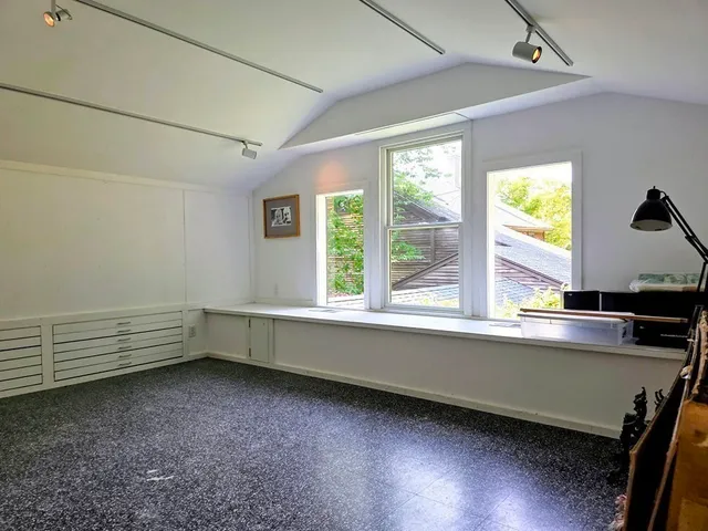 a backyard of a house with seating space