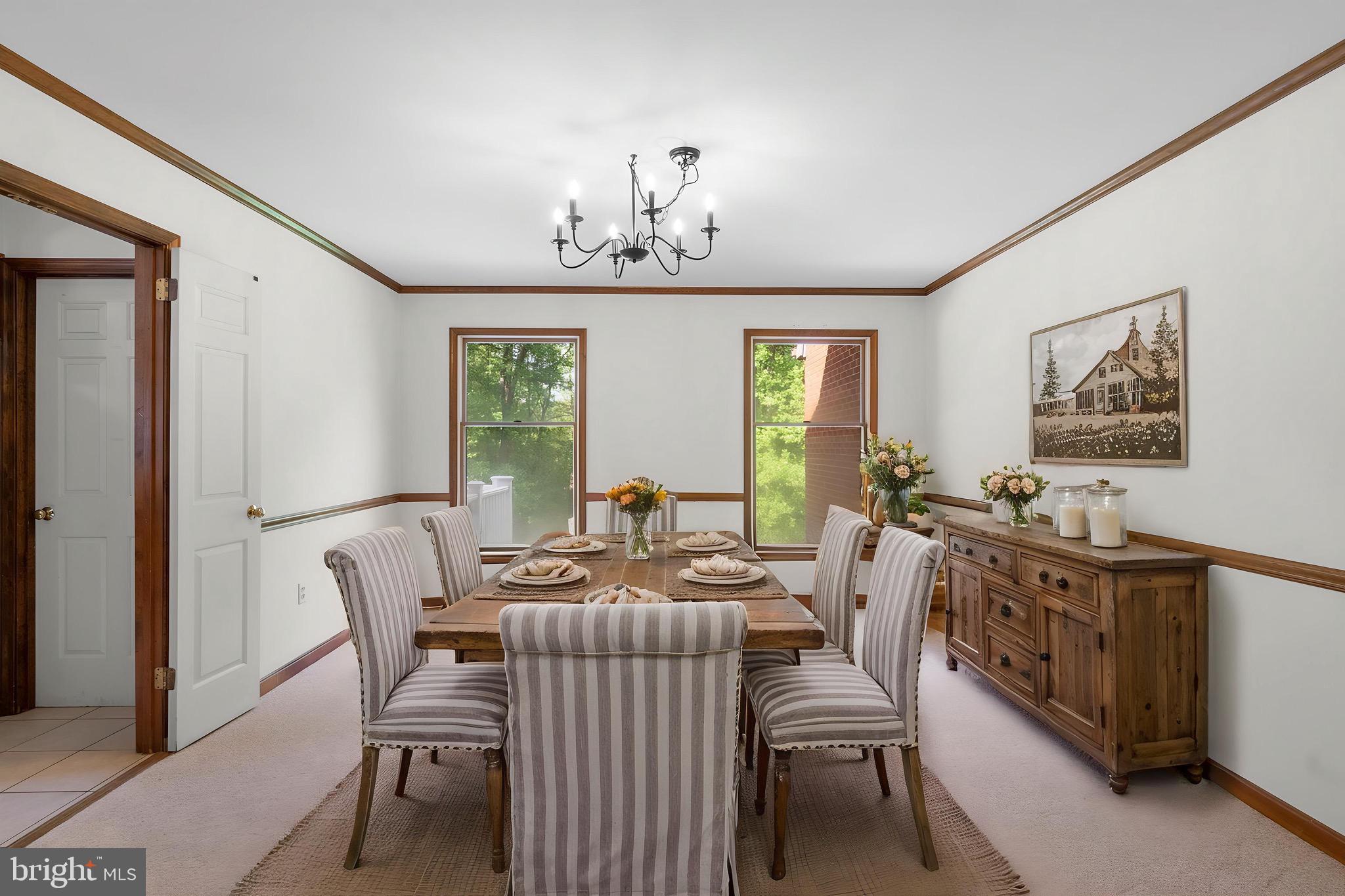 15220 Redgate Drive Silver Spring, MD 20905 - Photo 24 of 65 a view of a dining room with furniture