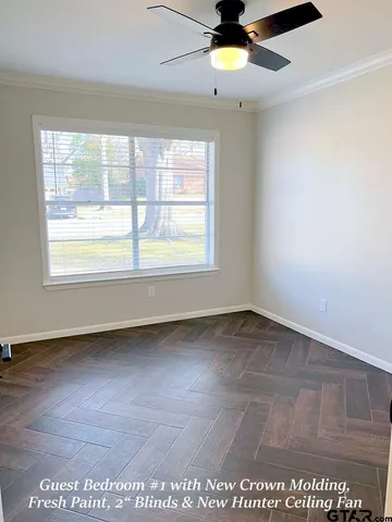 a bathroom with a shower and a toilet