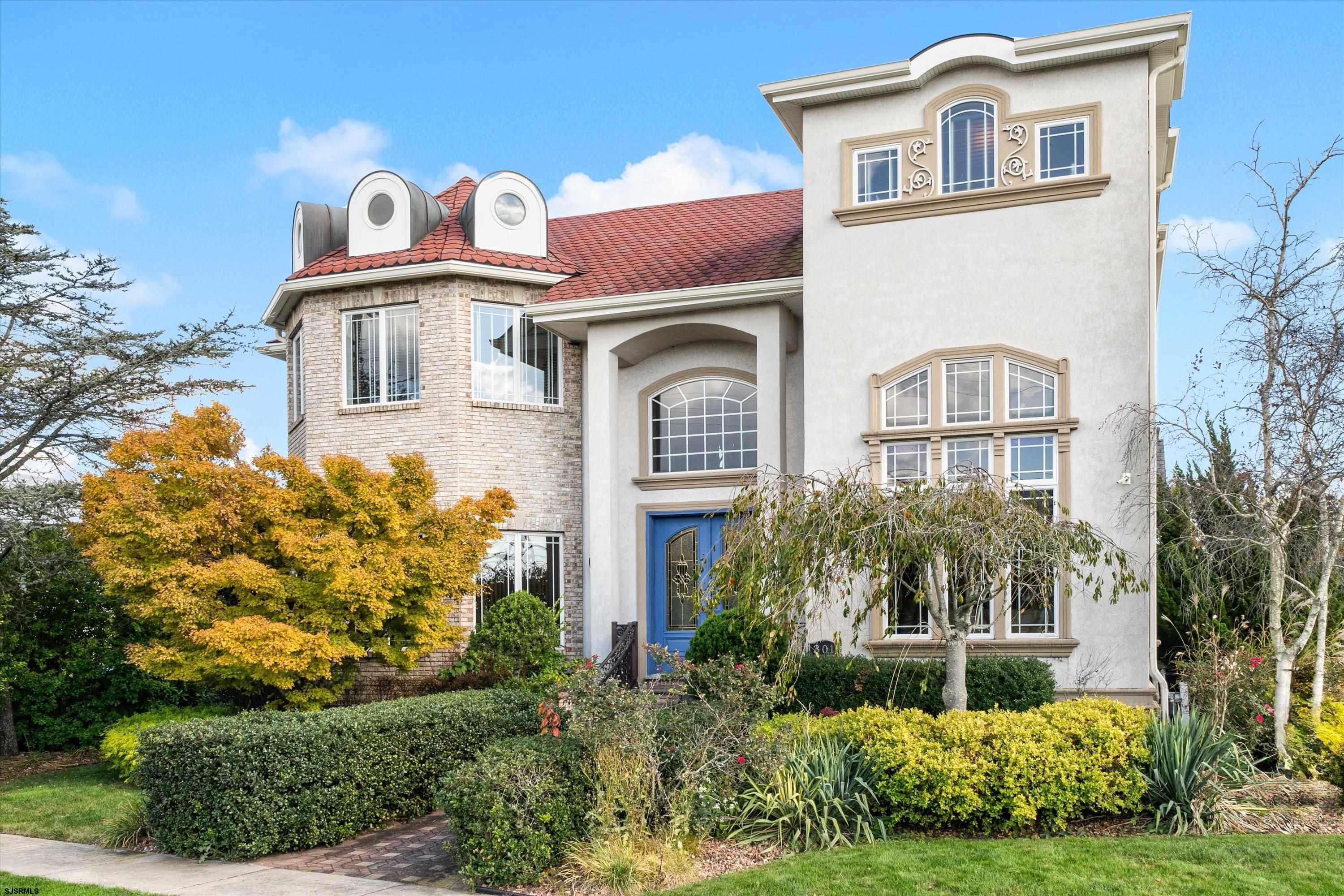 301 Wesley Road Ocean City, NJ 08226 - Photo 40 of 44 a front view of a house with garden