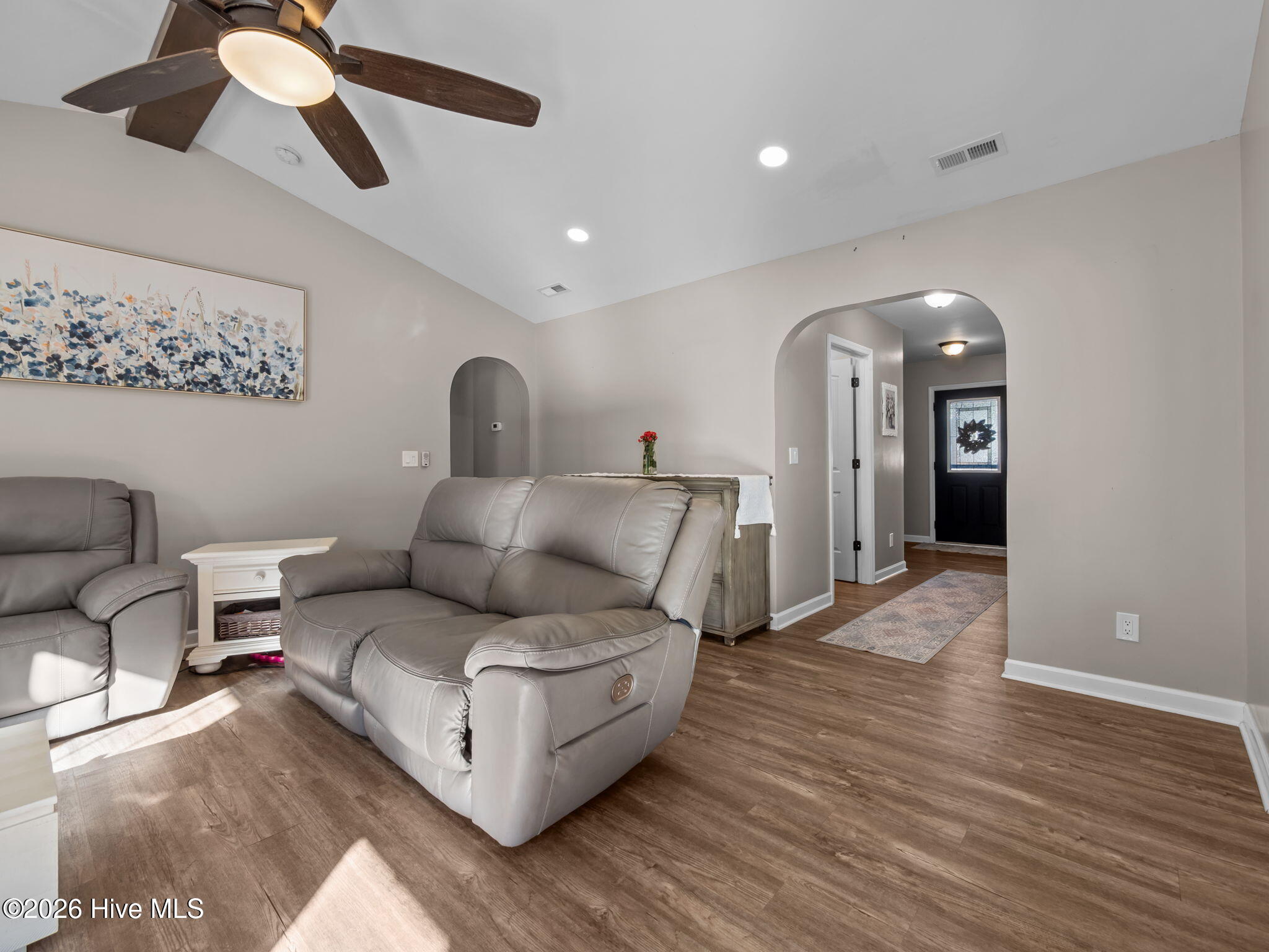 204 Demetrius Court Hubert, NC 28539 - Photo 8 of 31 Living room leading to Primary bedroom and Foyer
