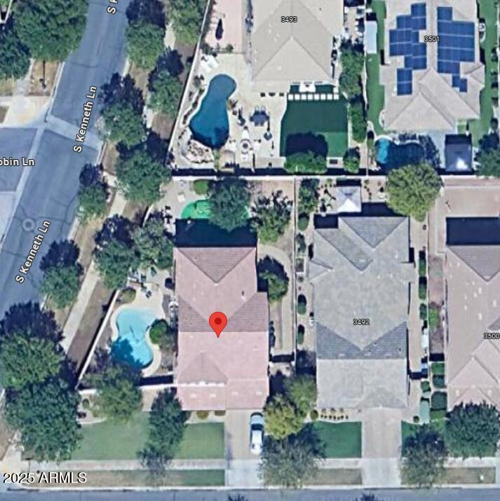 an aerial view of multiple houses with outdoor space