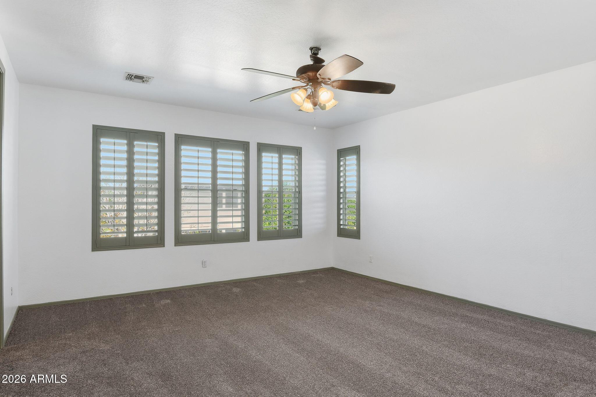 3484 East Mesquite Street Gilbert, AZ 85296 - Photo 10 of 16 a view of an empty room with a window