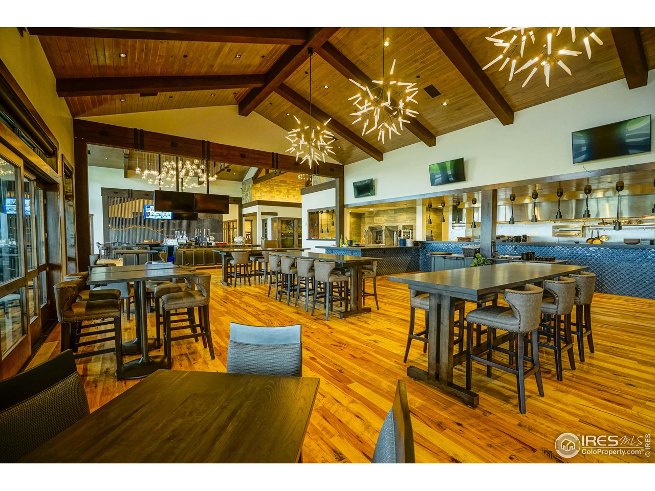 2575 Southwind Road Berthoud, CO 80513 - Photo 5 of 14 a view of a swimming pool with outdoor seating