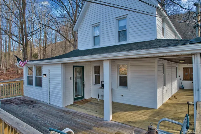 a view of a house with a large window
