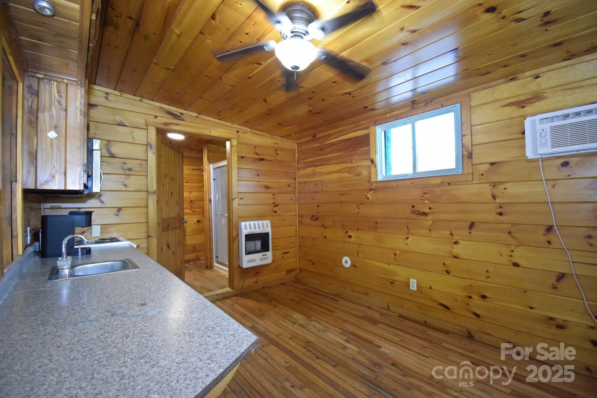 2941 Roby Martin Road Lenoir, NC 28645 - Photo 20 of 47 a bathroom with a sink and a mirror