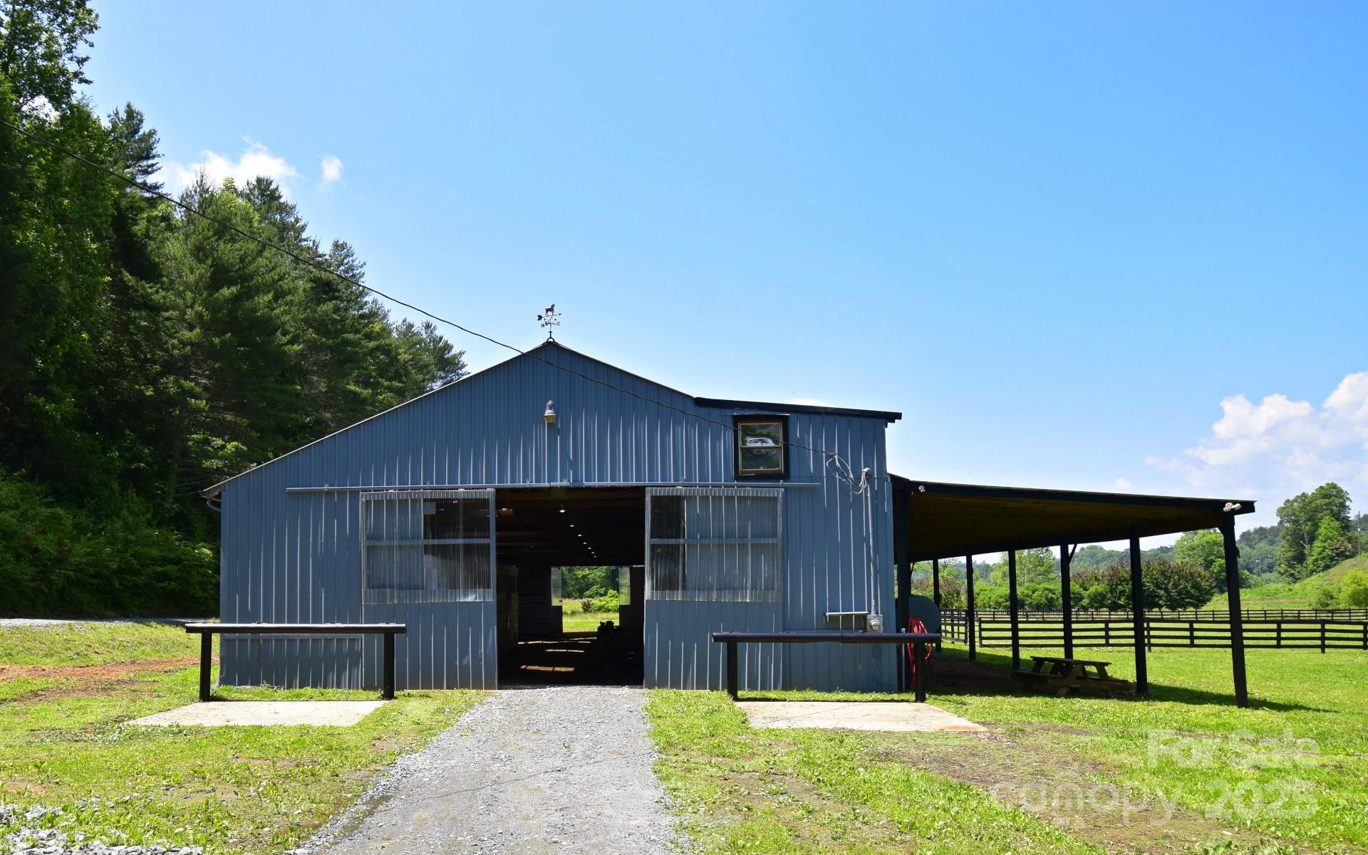 2941 Roby Martin Road Lenoir, NC 28645 - Photo 4 of 47 a house view with a garden space
