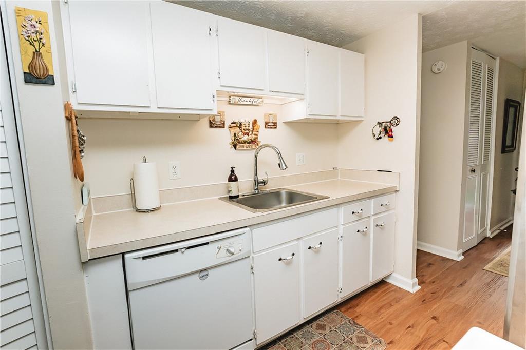 3184 Newcastle Way Snellville, GA 30039 - Photo 28 of 36 a kitchen with a sink and cabinets