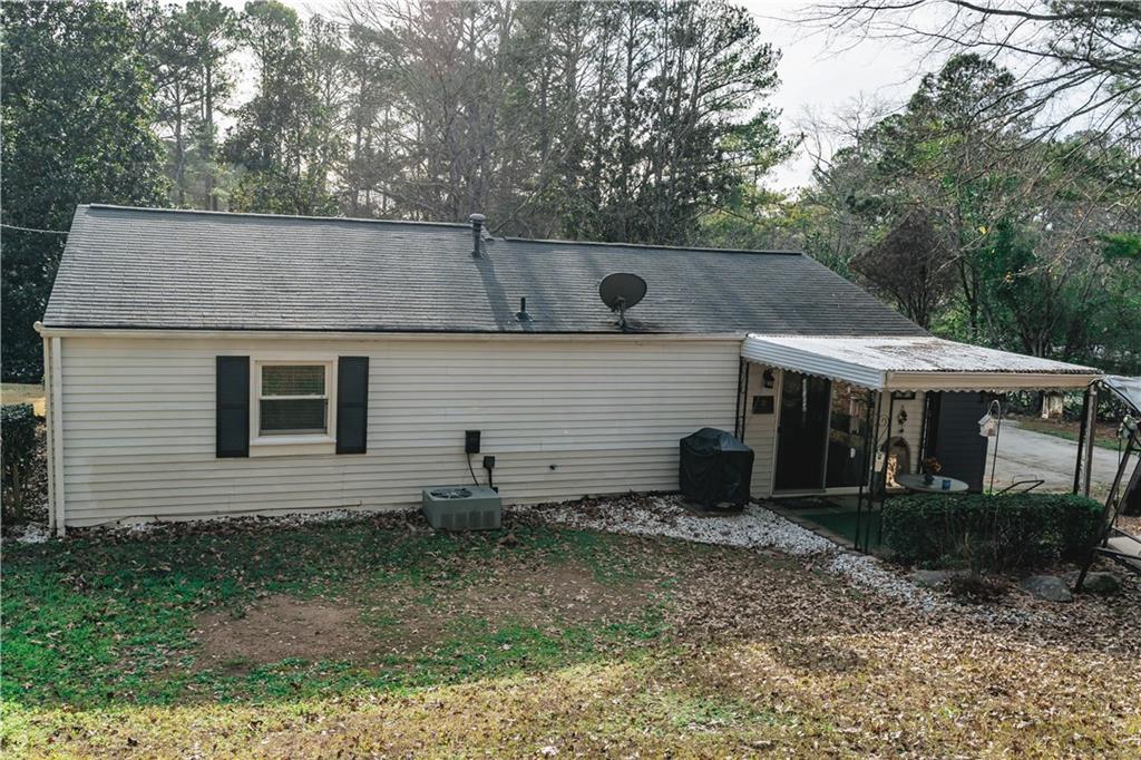 3184 Newcastle Way Snellville, GA 30039 - Photo 6 of 36 a view of house with backyard