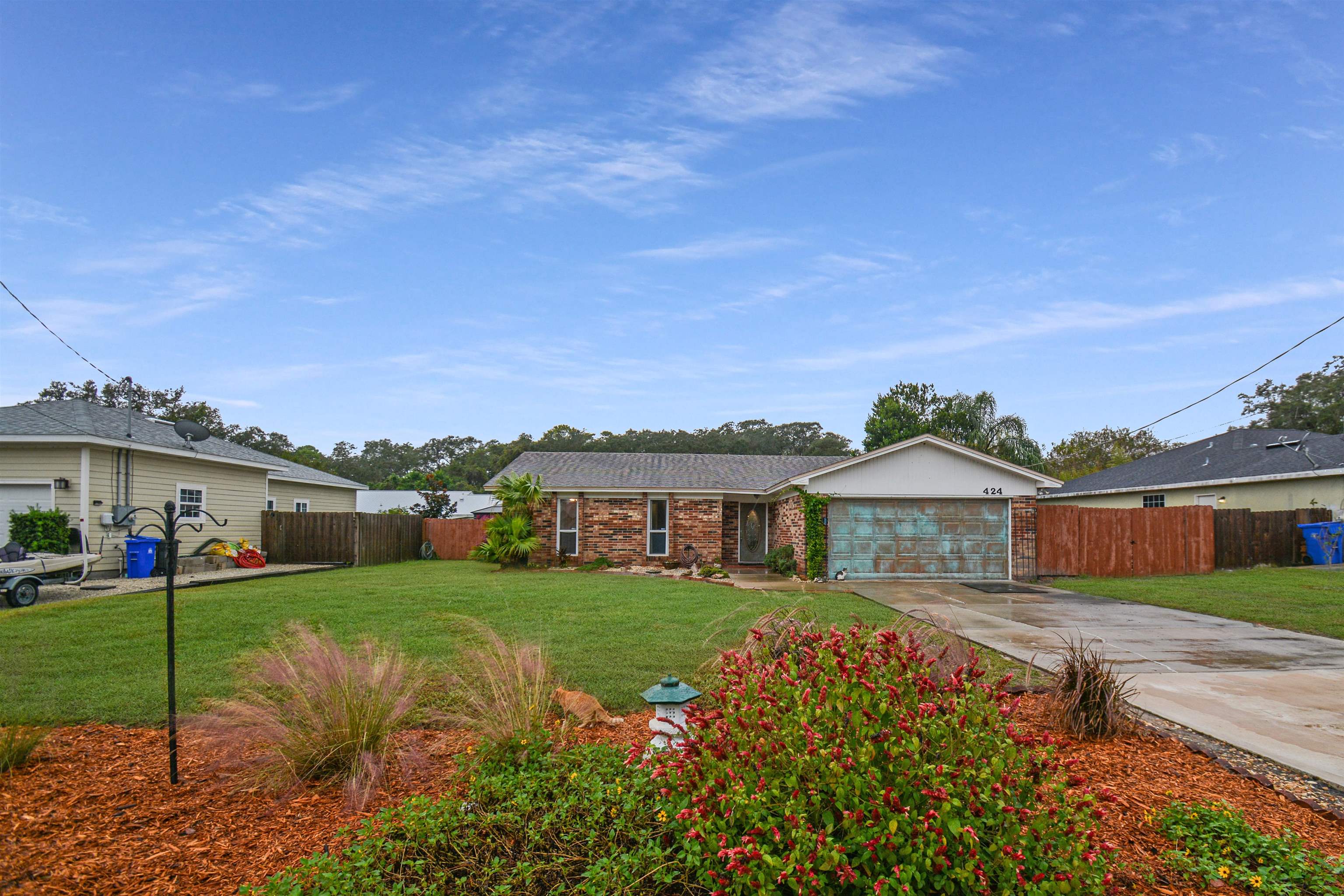 424 Segovia Road St. Augustine, FL 32086 - Photo 2 of 25 a front view of a house with a yard