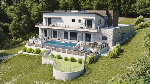 a aerial view of a house with swimming pool and garden