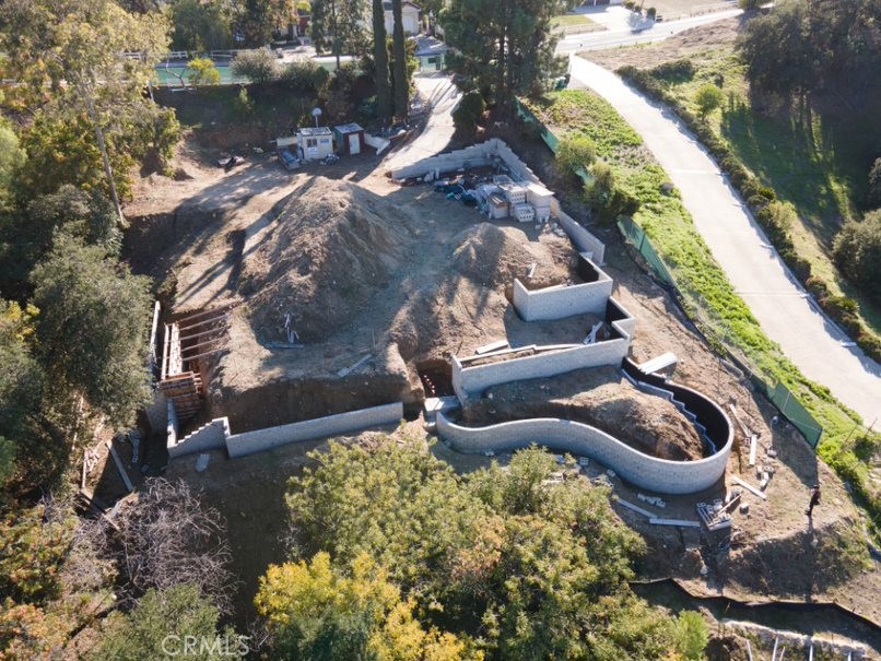 23509 Ridge Line Road Diamond Bar, CA 91765 - Photo 20 of 23 a backyard of a house with lots of green space and lake view
