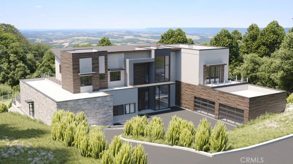 23509 Ridge Line Road Diamond Bar, CA 91765 - Photo 2 of 23 aerial view of a house with large windows and a yard