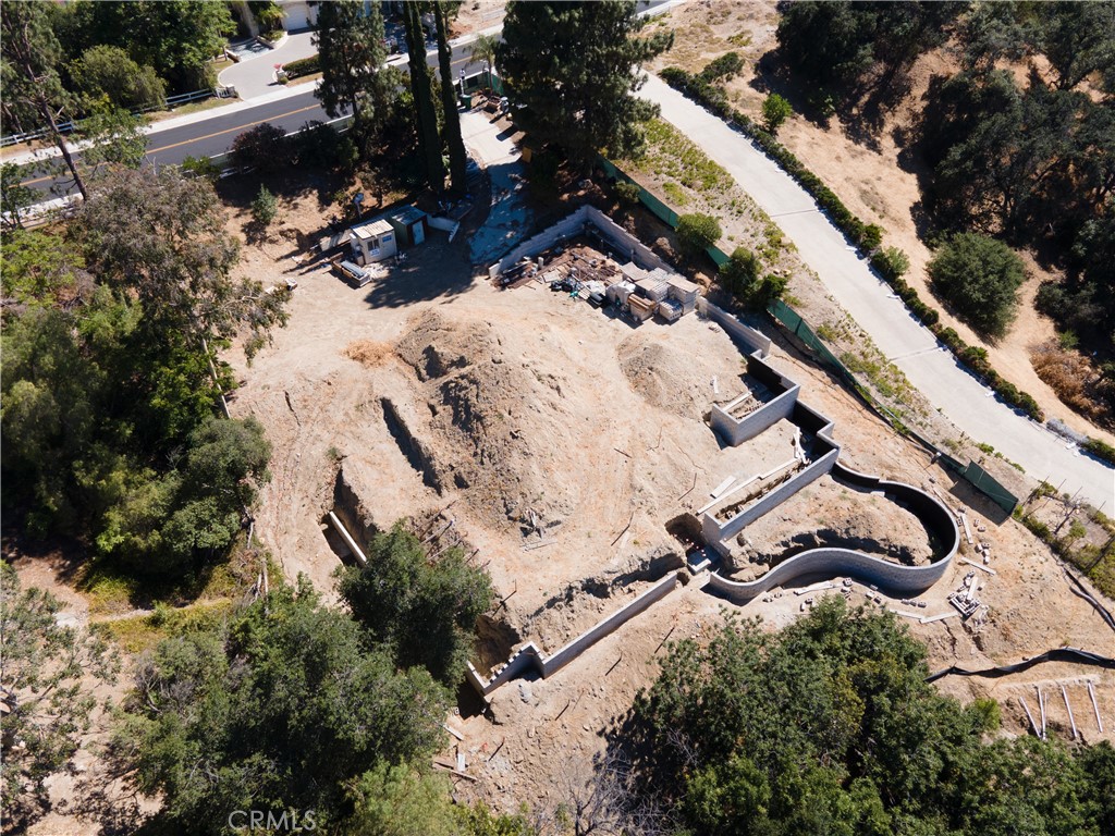 23509 Ridge Line Road Diamond Bar, CA 91765 - Photo 22 of 23 a view of tall trees with wooden fence