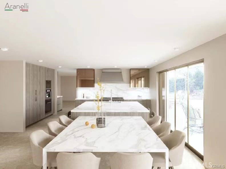 23509 Ridge Line Road Diamond Bar, CA 91765 - Photo 6 of 23 a large white kitchen with sink and breakfast area