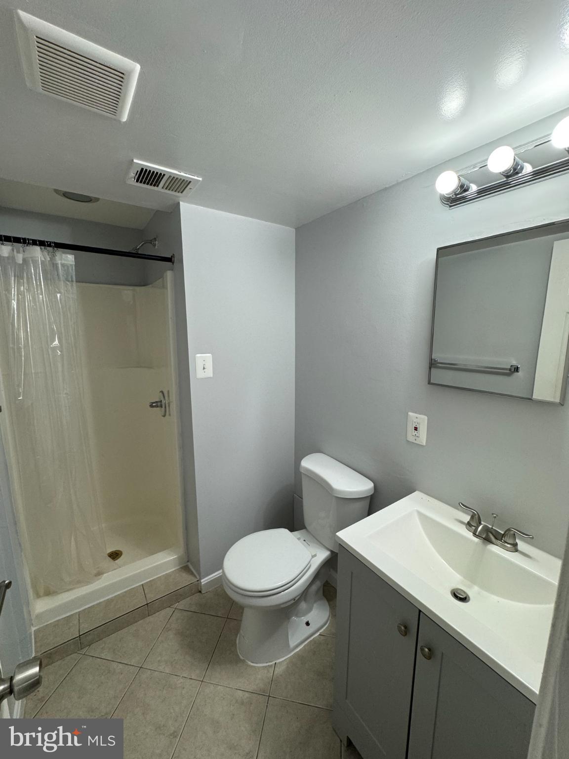 2500 Markham Lane, Unit 2 Landover, MD 20785 - Photo 18 of 27 a bathroom with a toilet sink and shower