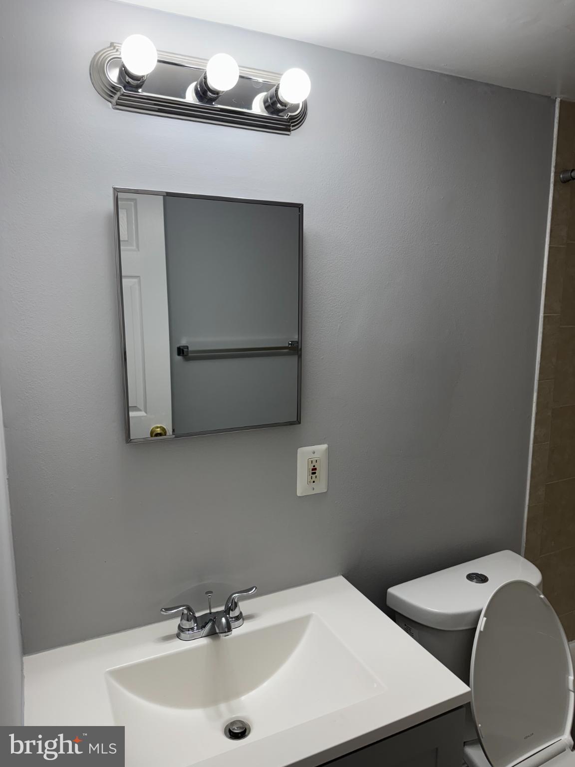 2500 Markham Lane, Unit 2 Landover, MD 20785 - Photo 20 of 27 a bathroom with a sink and a mirror