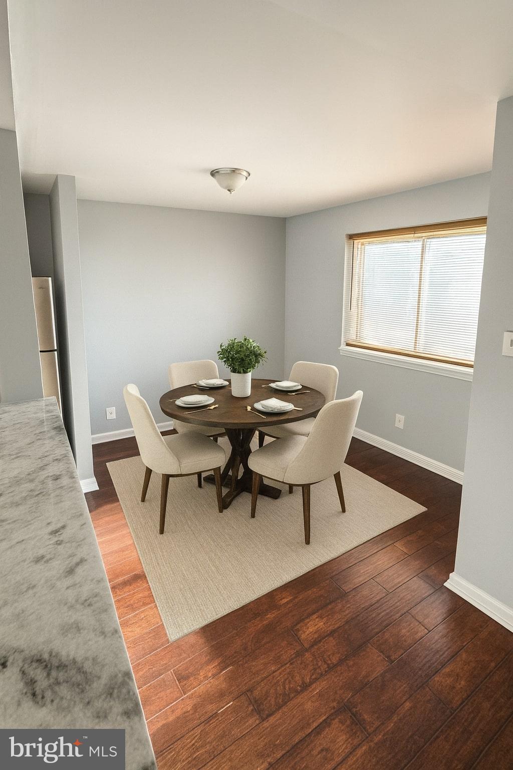 2500 Markham Lane, Unit 2 Landover, MD 20785 - Photo 4 of 27 a view of a dining room with furniture and wooden floor