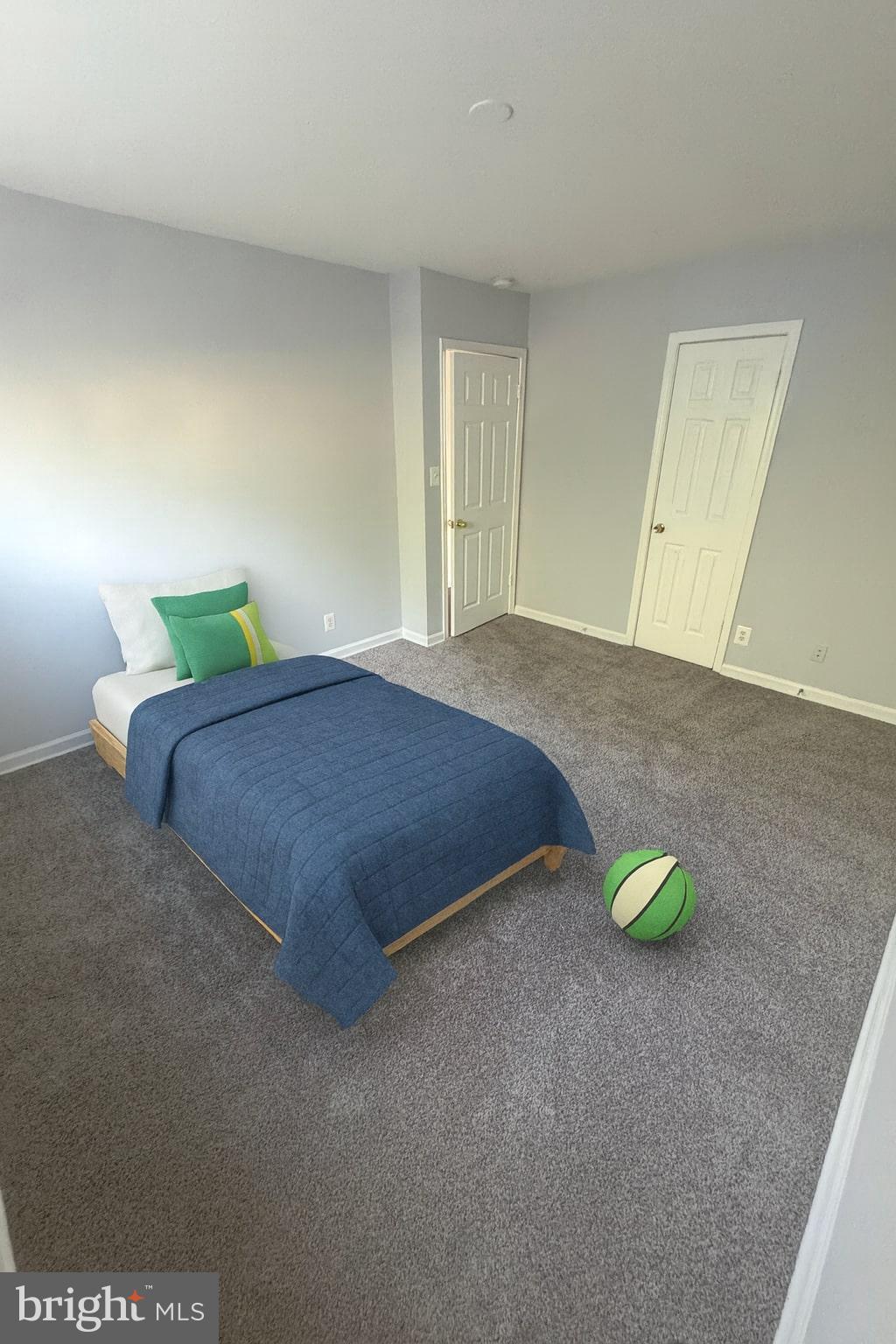 2500 Markham Lane, Unit 2 Landover, MD 20785 - Photo 7 of 27 a bedroom with a bed and a window