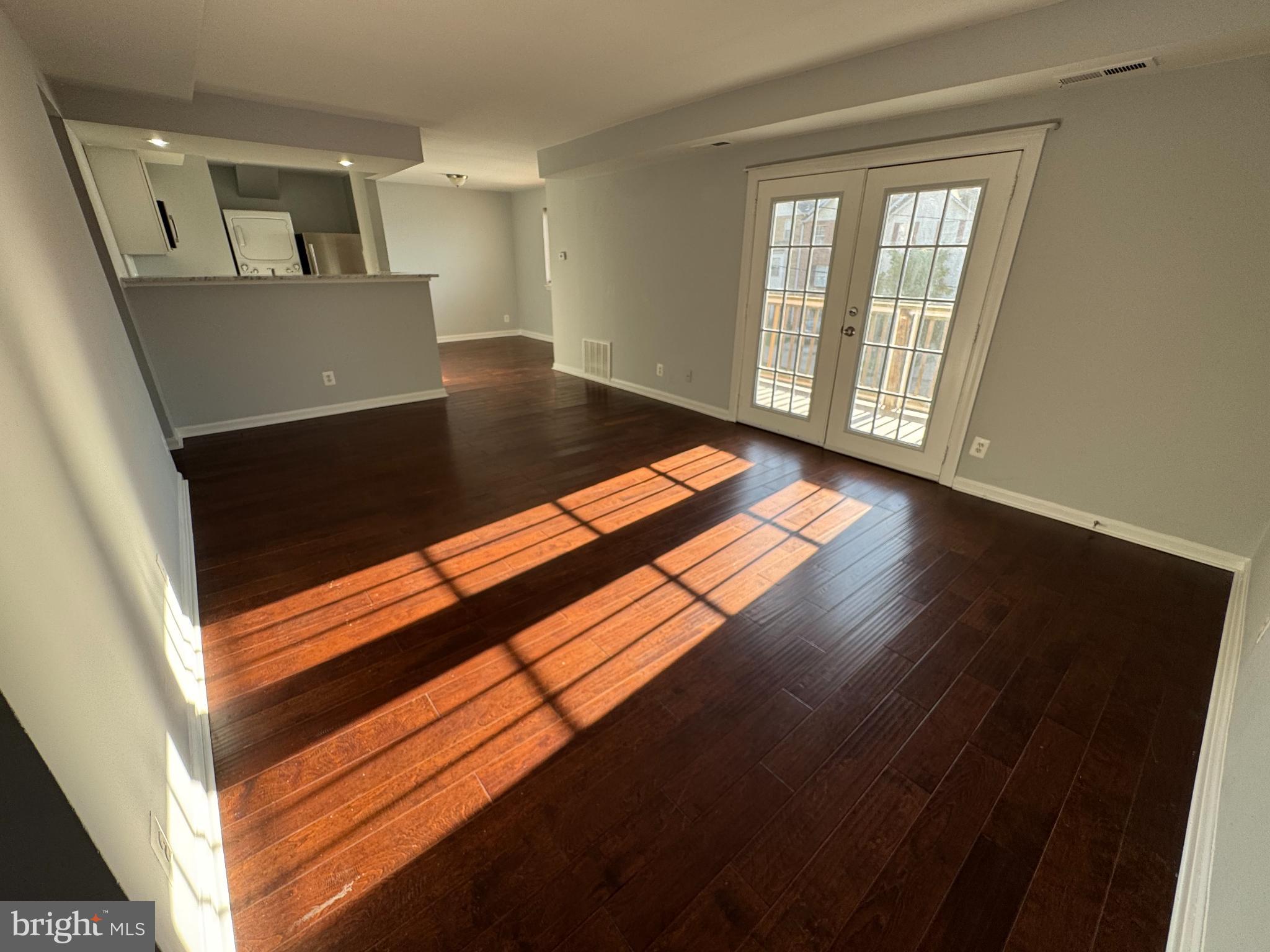 2500 Markham Lane, Unit 2 Landover, MD 20785 - Photo 8 of 27 a view of wooden floor and windows in a room