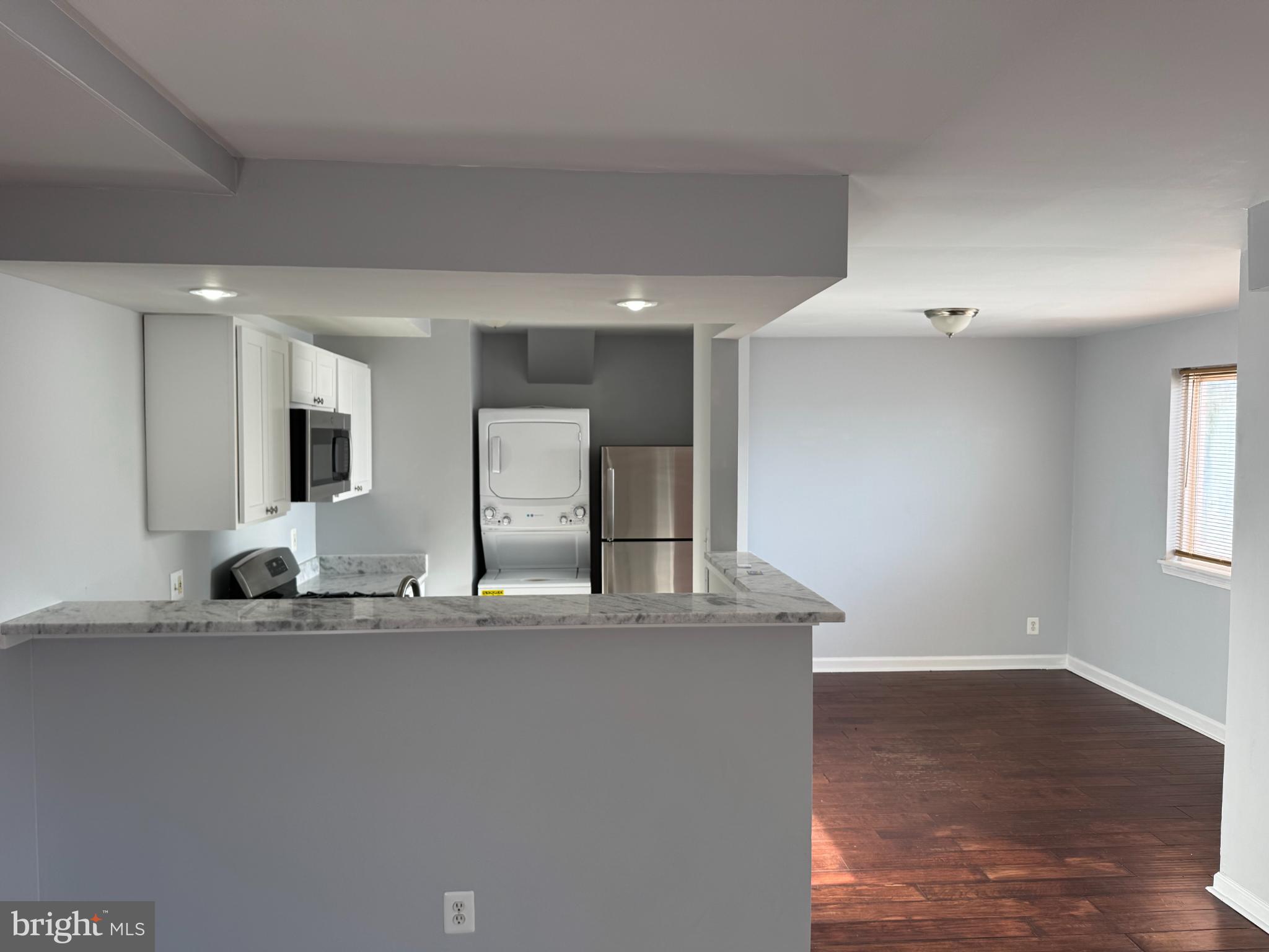 2500 Markham Lane, Unit 2 Landover, MD 20785 - Photo 9 of 27 a bathroom with a sink and a mirror