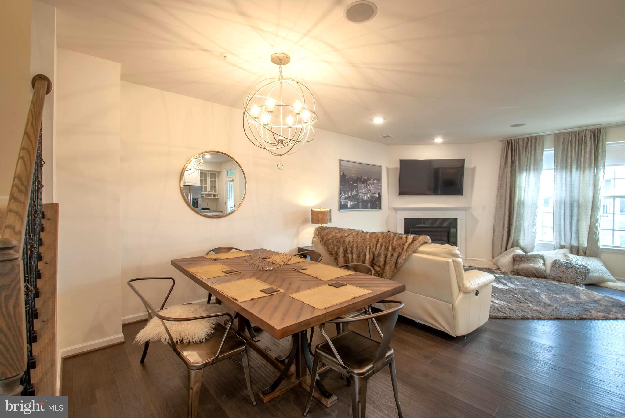 8038 Orchard Grove Road, Unit 20 Odenton, MD 21113 - Photo 13 of 30 Dining Area with Artisan Orb Chandelier