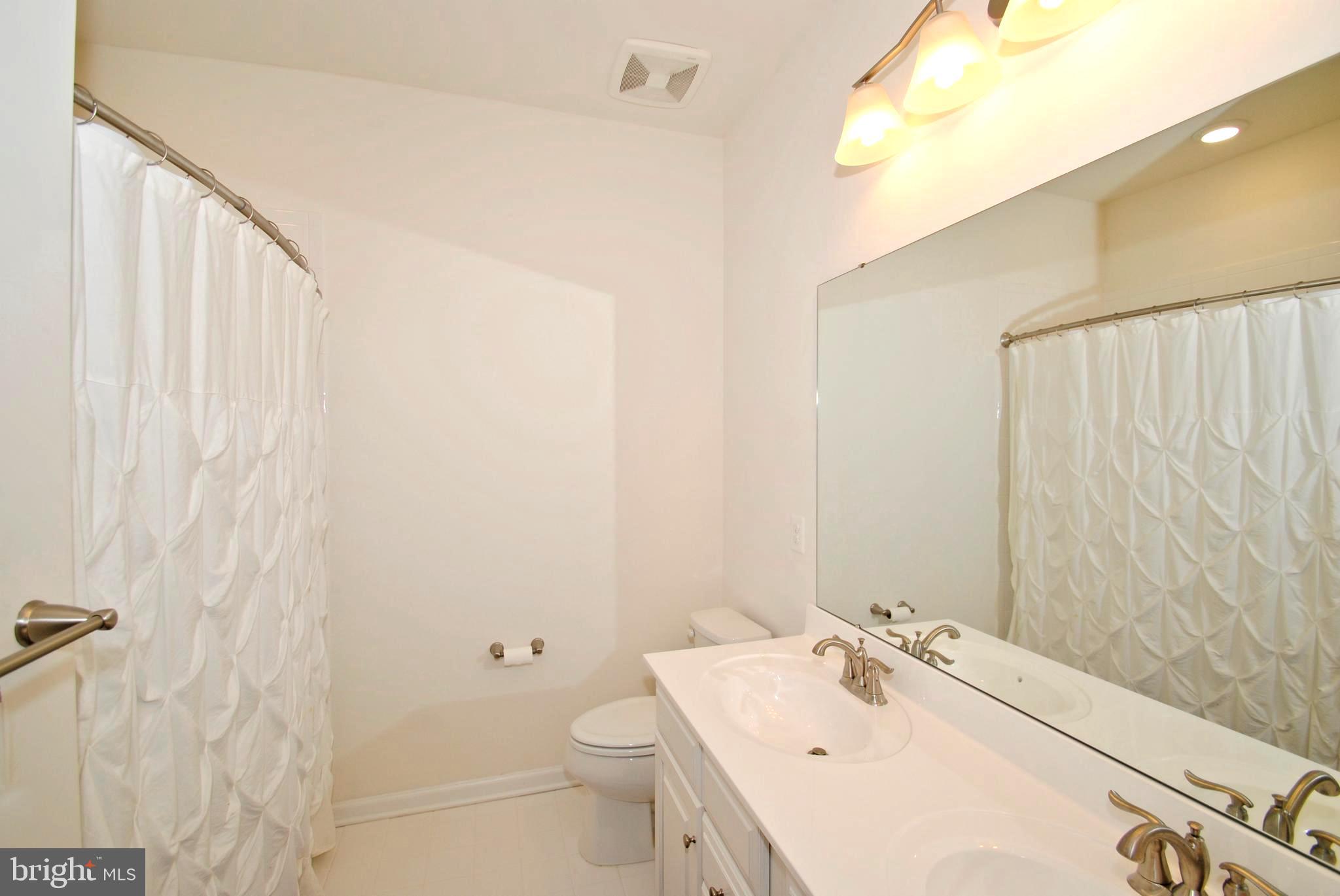 8038 Orchard Grove Road, Unit 20 Odenton, MD 21113 - Photo 25 of 30 Attractively Appointed Hall Full Bath