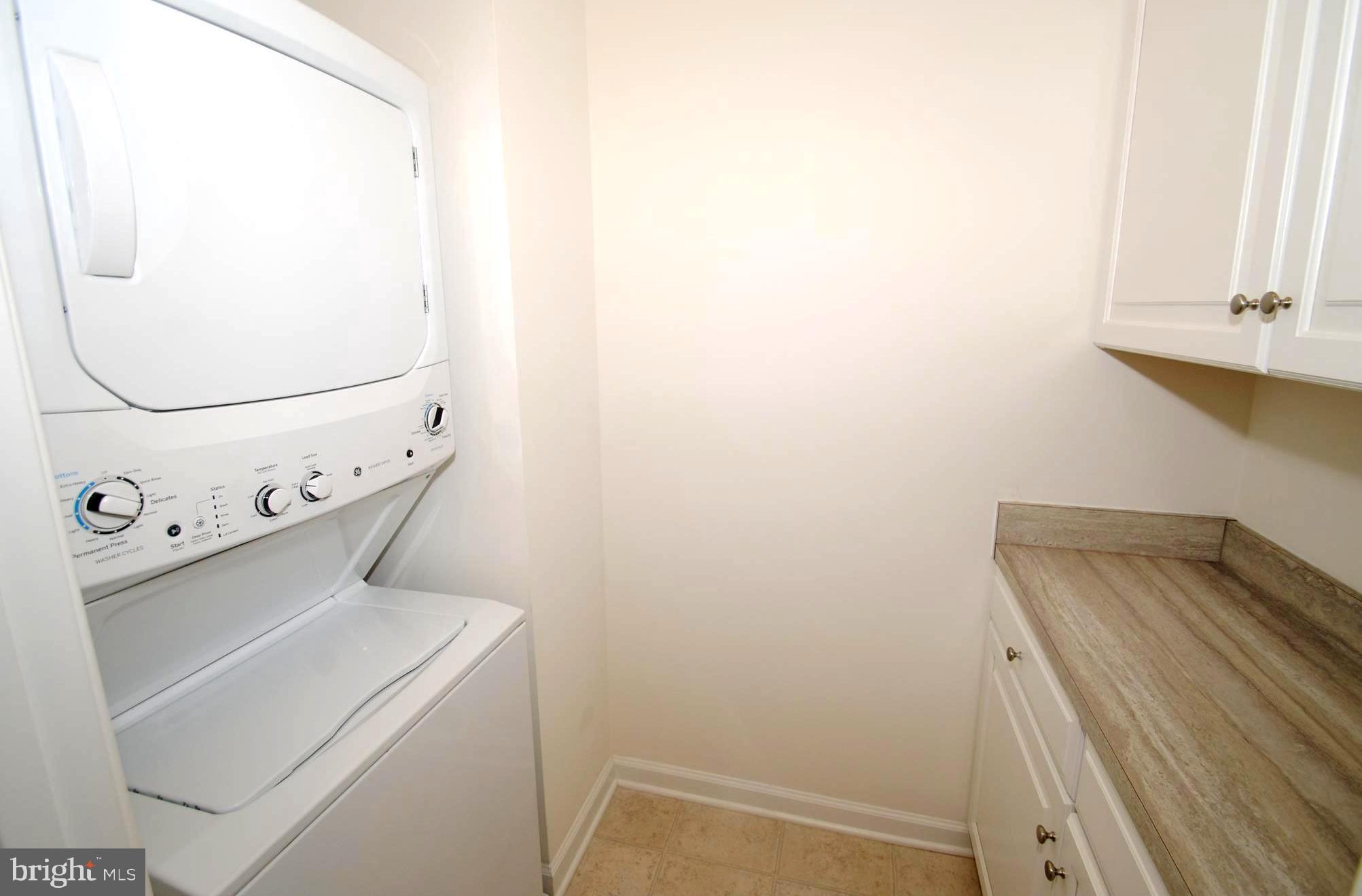 8038 Orchard Grove Road, Unit 20 Odenton, MD 21113 - Photo 26 of 30 Bedroom Level Laundry with Folding Counter