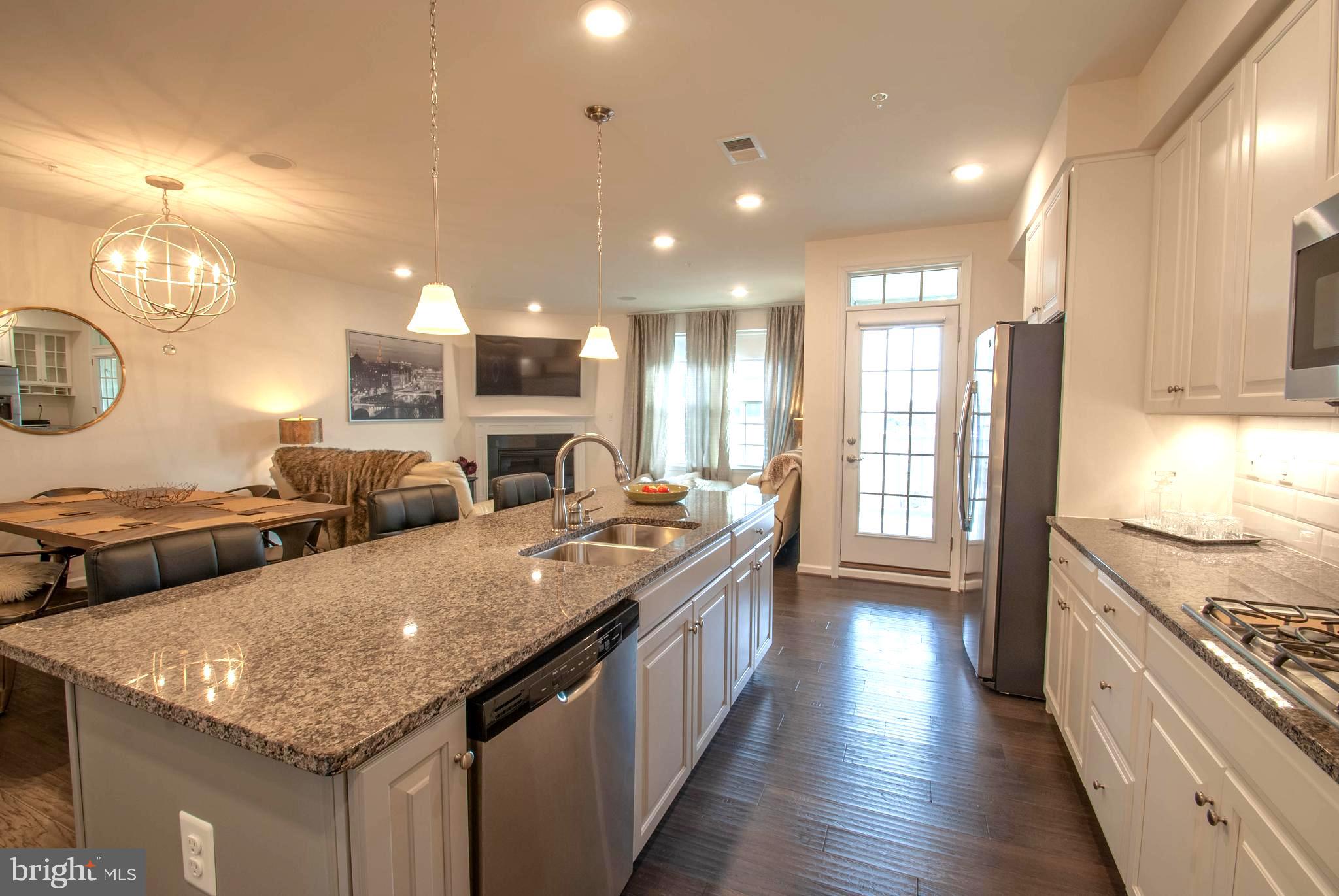 8038 Orchard Grove Road, Unit 20 Odenton, MD 21113 - Photo 5 of 30 Entertain in Your Gleaming Urban Kitchen!