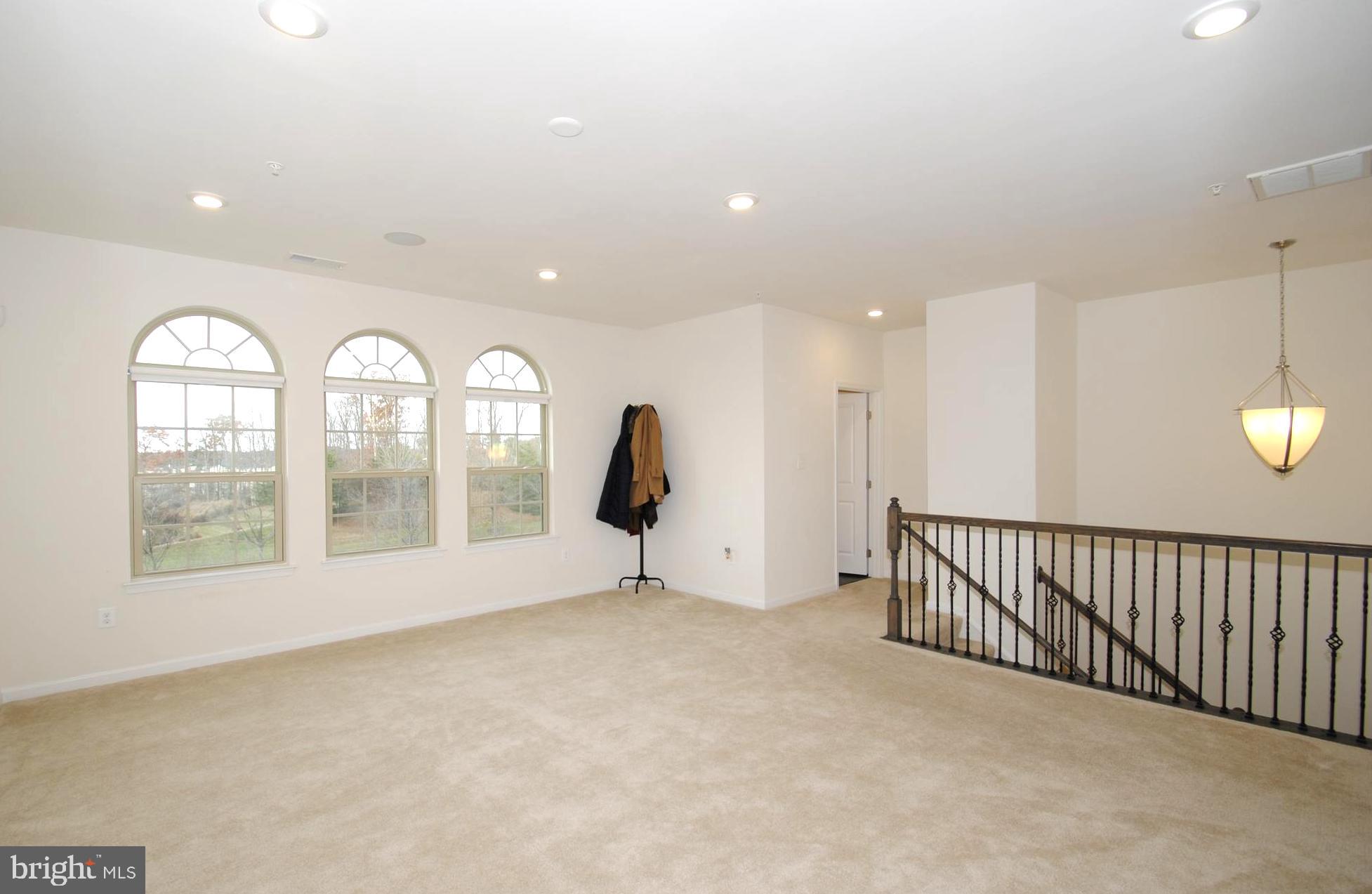 8038 Orchard Grove Road, Unit 20 Odenton, MD 21113 - Photo 9 of 30 Living Room with Elegant Palladian Windows