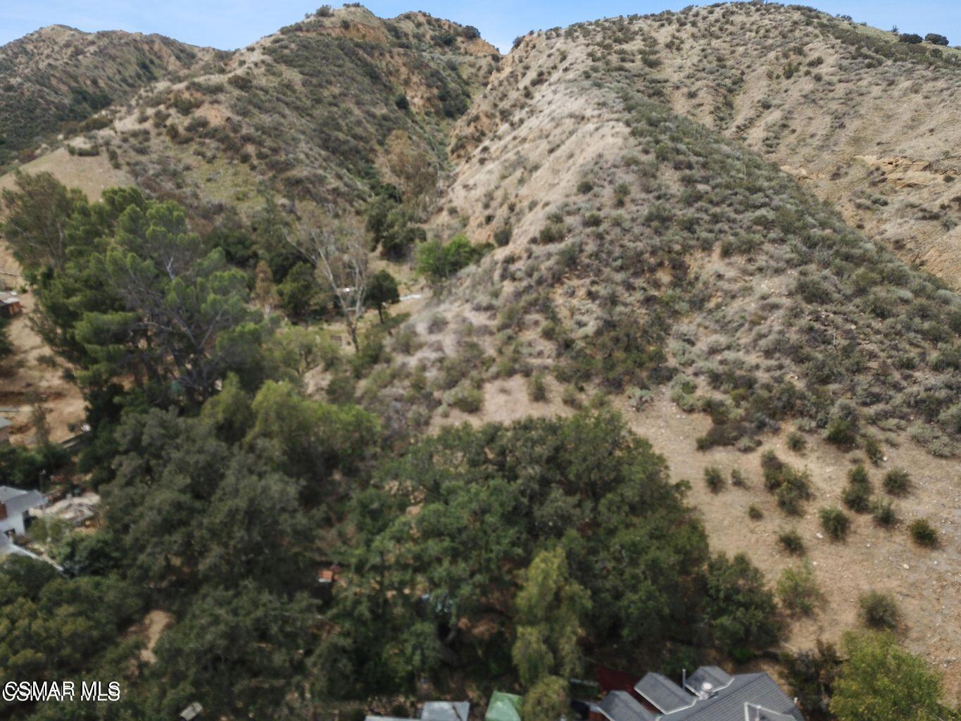 Oak Knolls Road Simi Valley, CA 93063 - Photo 11 of 23 a view of a field with mountains in the background