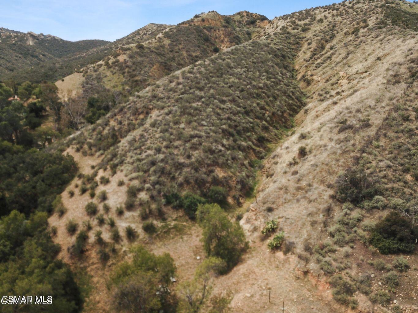 Oak Knolls Road Simi Valley, CA 93063 - Photo 13 of 23 a view of a dry yard with mountains and green space