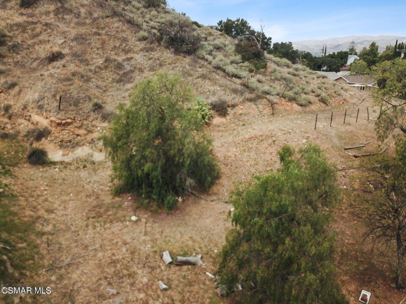 Oak Knolls Road Simi Valley, CA 93063 - Photo 3 of 23 a view of a yard with a tree