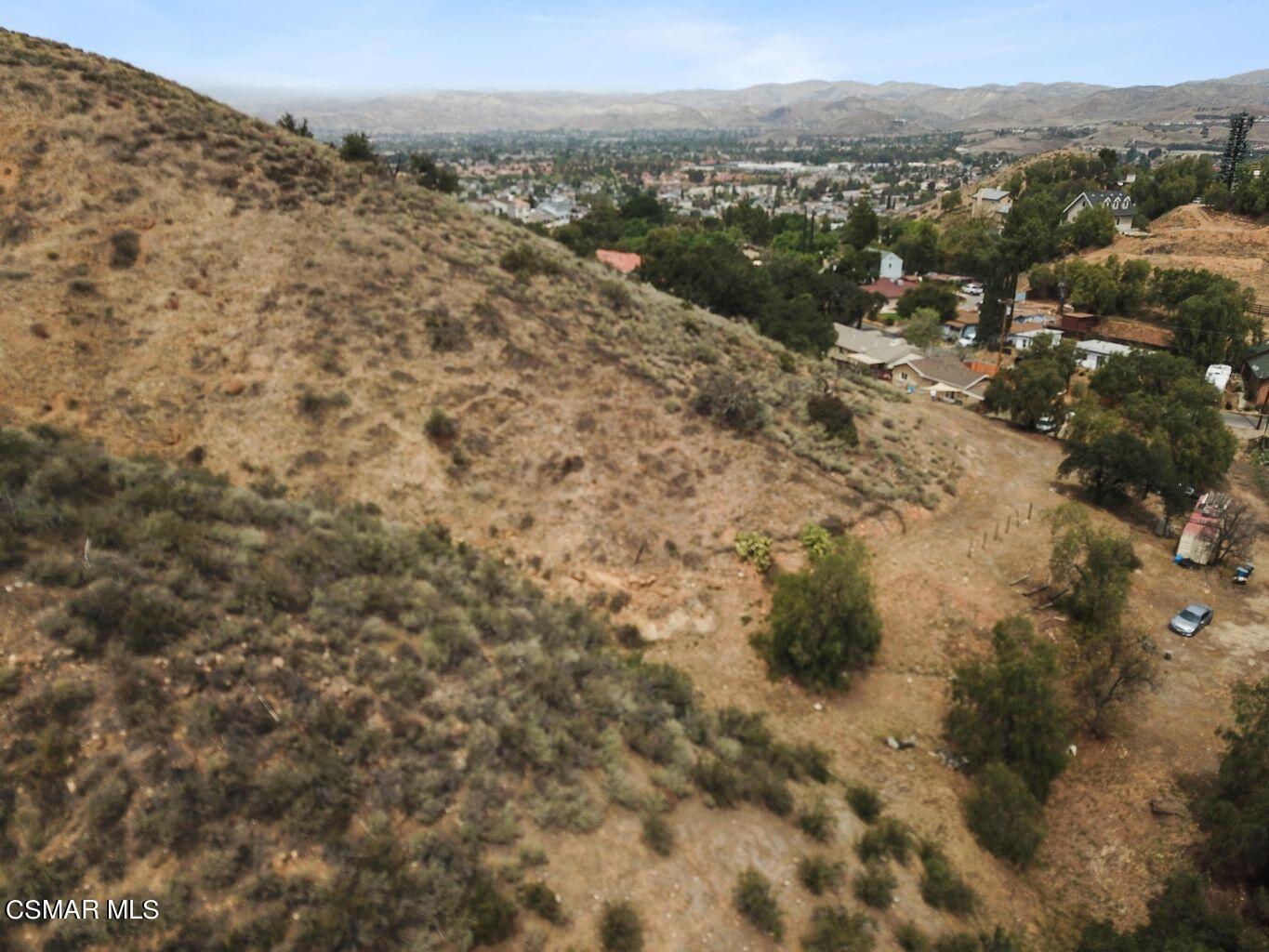 Oak Knolls Road Simi Valley, CA 93063 - Photo 5 of 23 a view of a dry yard with mountains and green space