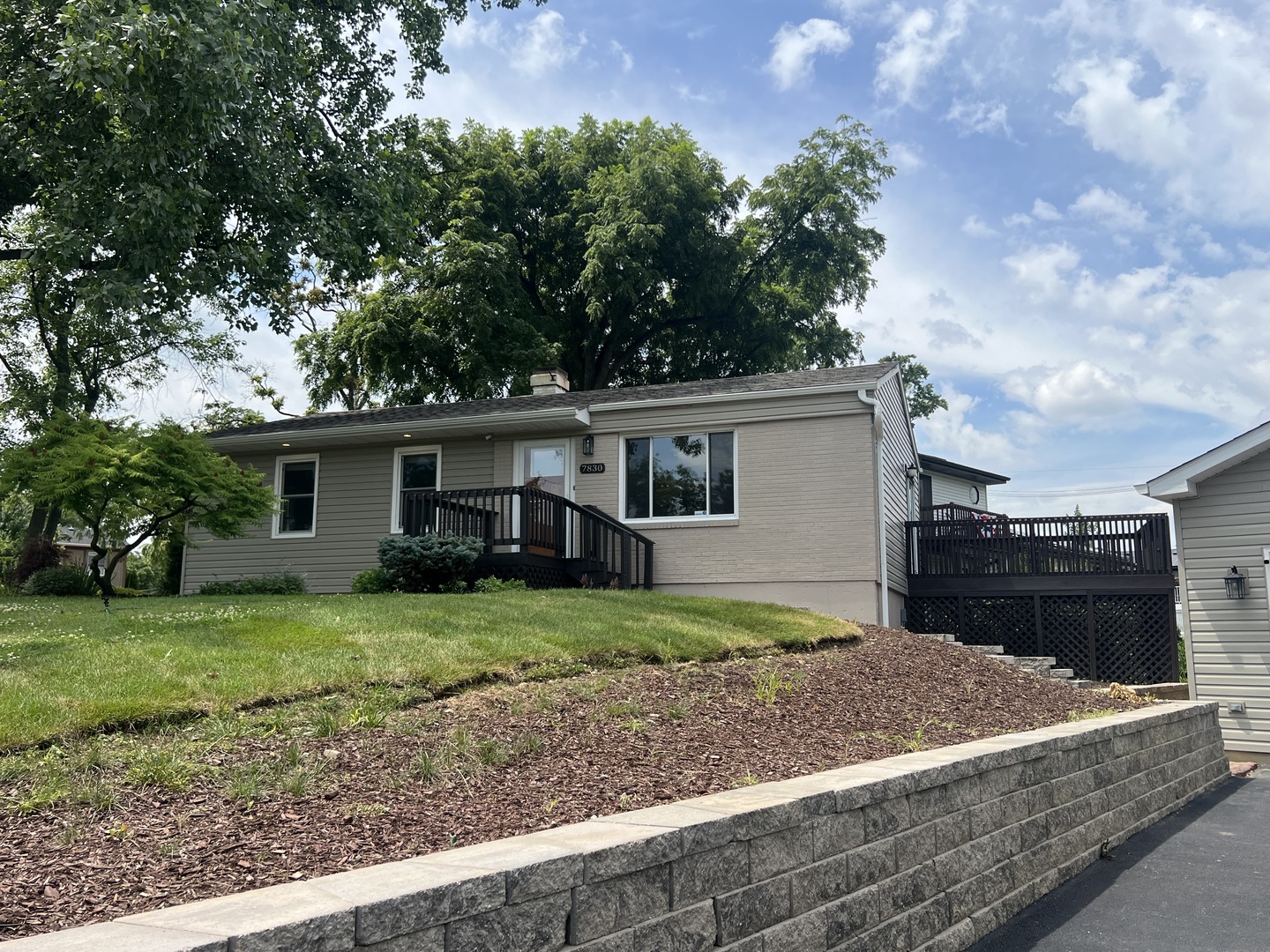 7830 Westview Lane Woodridge, IL 60517 - Photo 2 of 26 a front view of a house with garden
