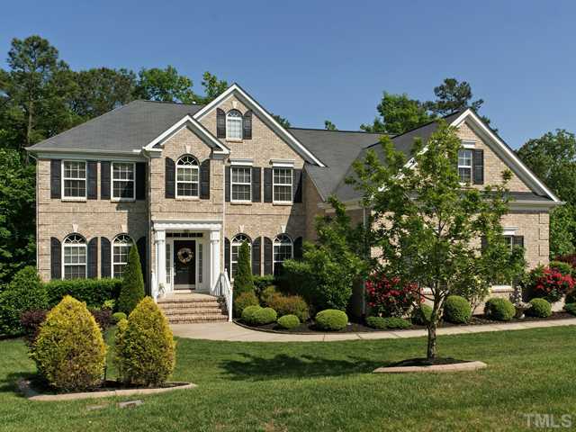 CUSTOM HOME WITH AMAZING LUSH LANDSCAPING!