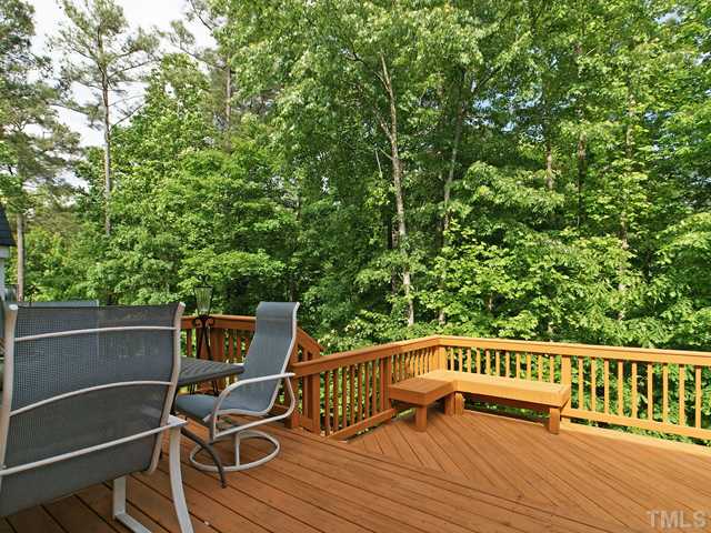 4449 Fairview Ridge Lane Apex, NC 27539 - Photo 22 of 25 MULIT-LEVEL DECK BACKS TO WOODED AREA!
