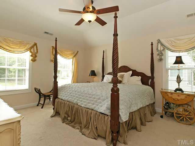 4449 Fairview Ridge Lane Apex, NC 27539 - Photo 9 of 25 LUXURY MASTER SUITE WITH SITTING AREA AND DECORATIVE CEILING!